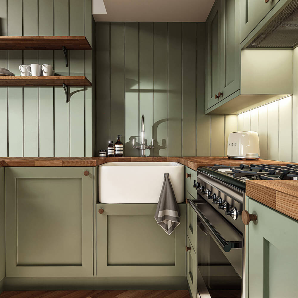 Kitchen detail render — Belfast sink, range cooker, sage tongue-and-groove panelling